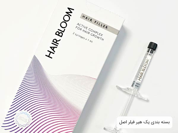 جعبه يک هير فيلر اصل به همراه سرنگ تزريق در پس زمينه سفيد.
